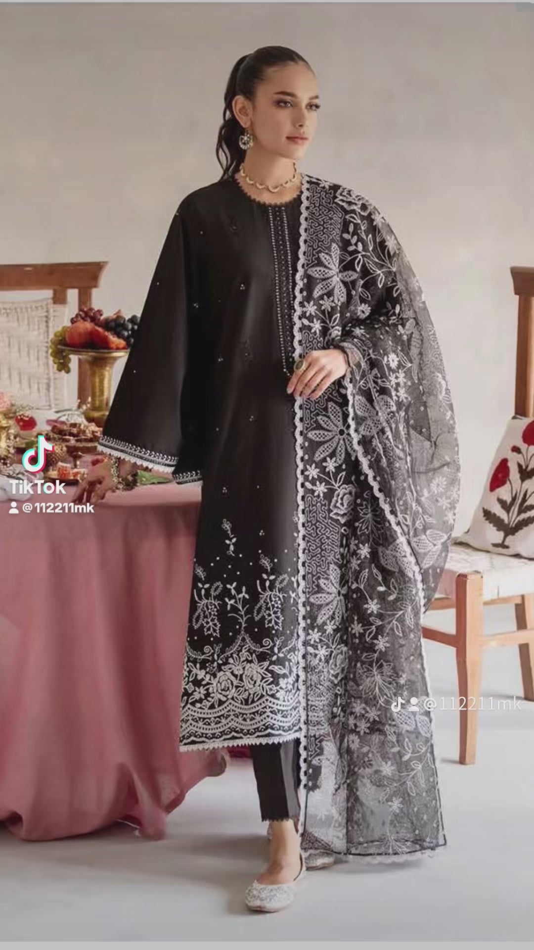 black embroidered suit
